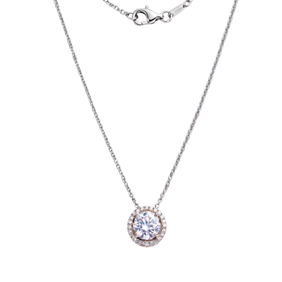A silver or white gold chain necklace featuring a round solitaire diamond pendant surrounded by a delicate halo of smaller pave-set diamonds, displayed against a dark, transparent checkerboard background.