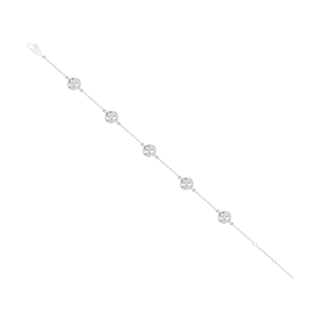 A full top-down view of a 14K white gold bracelet, showing the spaced-out, bezel-set diamonds on the delicate chain.