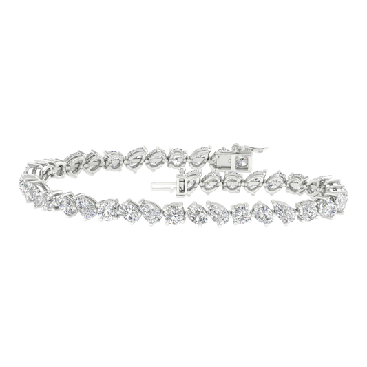 Front view of a marquise-cut diamond tennis bracelet in white gold, featuring a continuous row of marquise diamonds set in a sleek, articulated design.