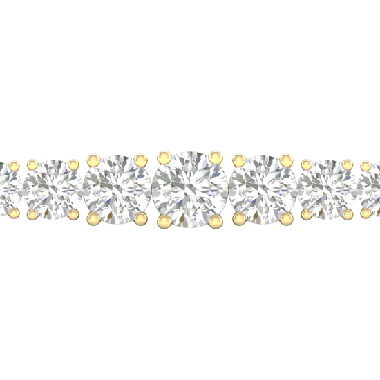 A close-up side view of a 14K yellow gold tennis bracelet, showing the graduated design with round diamonds getting larger in the center.