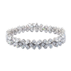 Front view of a diamond floral tennis bracelet in white gold, featuring marquise and round diamonds arranged in repeating flower-inspired clusters with a flexible, high-polish setting.