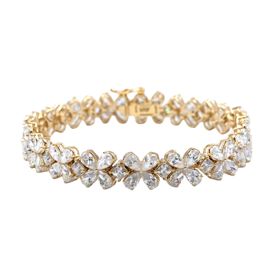Front view of a diamond floral tennis bracelet in rose gold, featuring marquise and round diamonds arranged in repeating flower-inspired clusters with a flexible, high-polish setting.