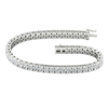A full top-down view of a 14K white gold bracelet, coiled to show the bold, double-line of brilliant diamonds.