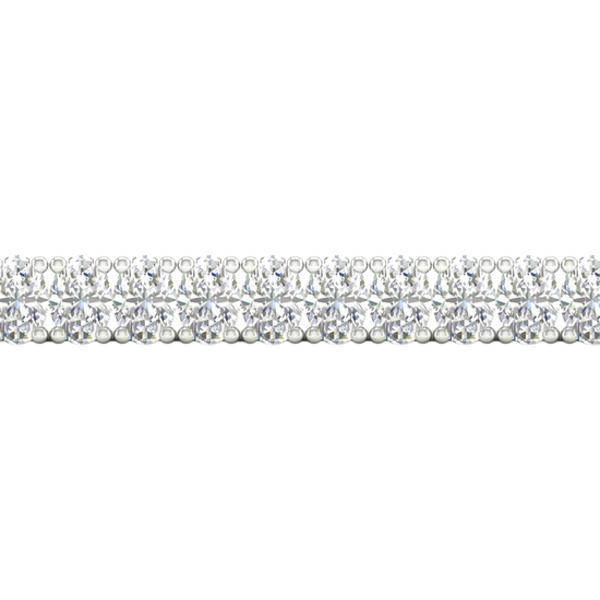 A close-up side view of a 14K white gold bracelet, showing a continuous double line of square-cut diamonds.