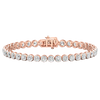 A full top-down view of a 14K rose gold tennis bracelet, coiled to show the seamless circle of brilliant diamonds.