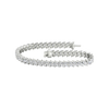 A full top-down view of a 14K white gold bracelet, coiled to show the continuous V-shaped pattern of marquise diamonds.