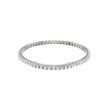 Angled view of the 14K white gold Round Diamond Tennis Bracelet, coiled to showcase the continuous line of lab grown diamonds.