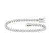 An angled view of the 14K white gold F VS diamond tennis bracelet, showing the gold cup setting and secure clasp.