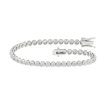 An angled view of the 14K white gold F VS diamond tennis bracelet, showing the gold cup setting and secure clasp.