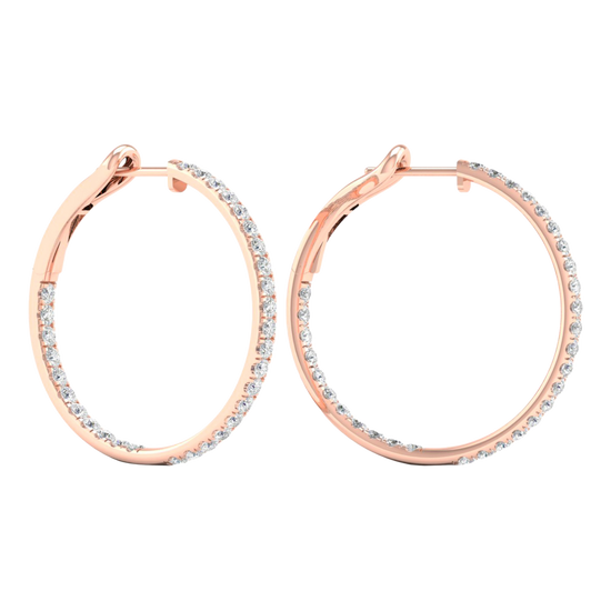 A pair of 14K rose gold large hoop earrings, shown from a side angle, highlighting the line of diamonds and the hinged closure.