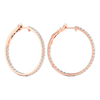A pair of 14K rose gold large hoop earrings, shown from a side angle, highlighting the line of diamonds and the hinged closure.