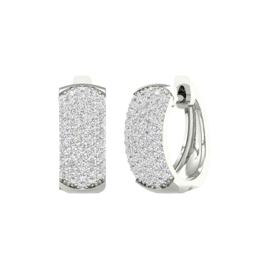 A front and angle view of 14K white gold chunky huggie hoops with pavé diamond-encrusted front.