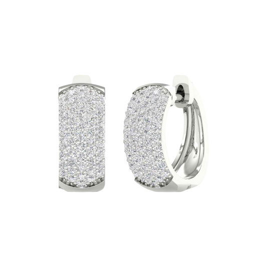 A front and angle view of 14K white gold chunky huggie hoops with pavé diamond-encrusted front.