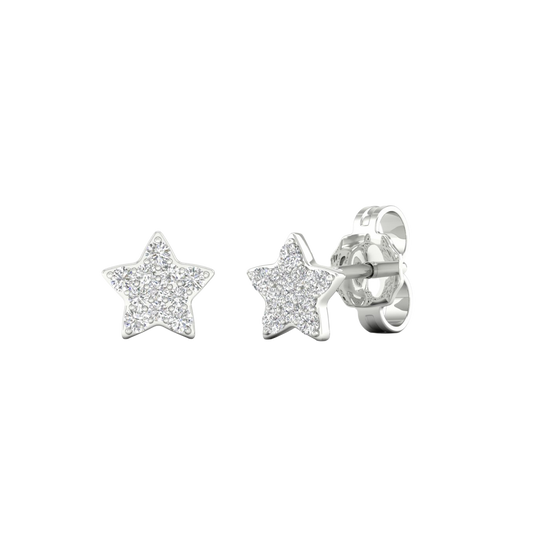 An angled view of a pair of 14K white gold star-shaped stud earrings with pavé diamonds, showcasing the full design.