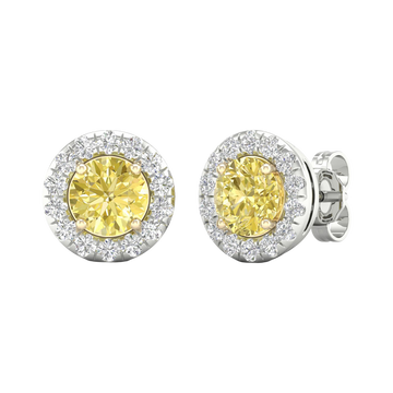 An angled view of a pair of 14K white gold stud earrings, with a with a 2 carat total weight VS+  yellow diamond at the center and a halo of white diamonds, showcasing the full design.