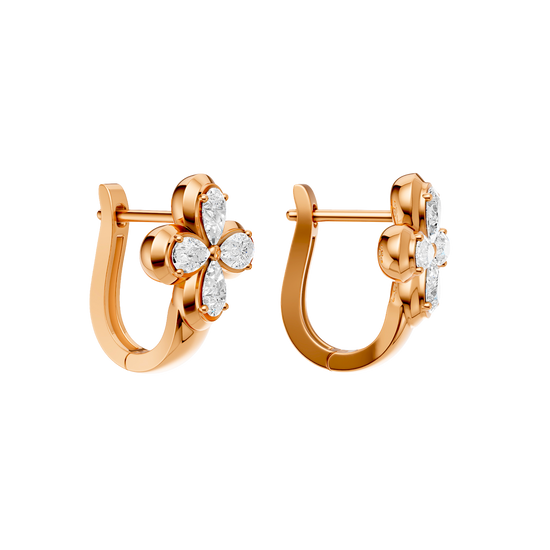 Back view of rose gold floral diamond huggie earrings displaying the smooth polished metal, hinge mechanism, and clean construction.