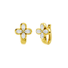 Angled view of yellow gold floral diamond huggie earrings highlighting warm gold tones, dimensional flower detailing, and diamond sparkle.