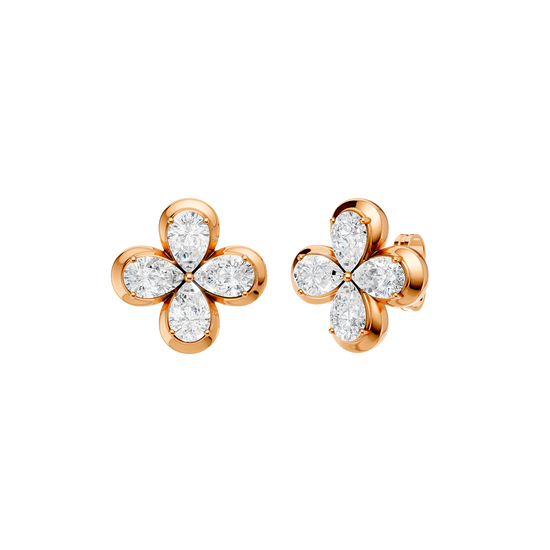 Angled view of rose gold floral diamond stud earrings highlighting the dimensional flower motif, marquise-cut diamond sparkle, and polished metal finish.