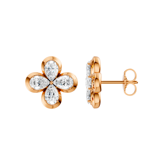 Side profile of rose gold floral diamond stud earrings showcasing the raised prong setting, secure post, and prong-back construction, and refined craftsmanship.
