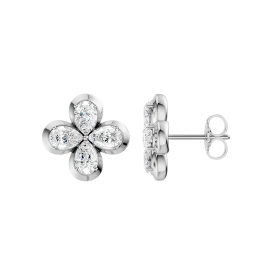 Side profile of white gold floral diamond stud earrings showcasing the raised prong setting, secure post, and prong-back construction, and refined craftsmanship.