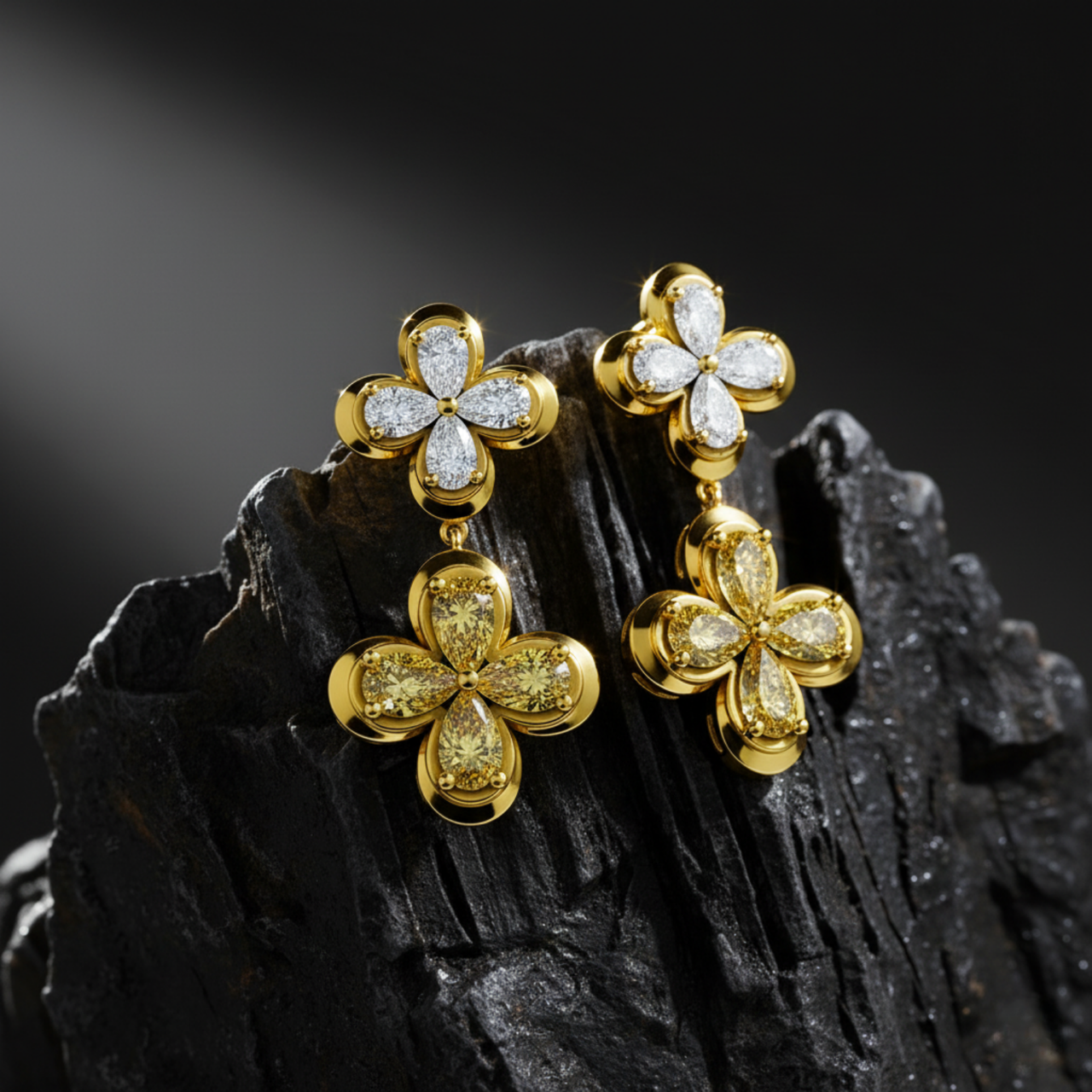 Celebrate moments of grandeur with these drop earrings featuring white and yellow diamond flowers resting on a dark, jagged rock.