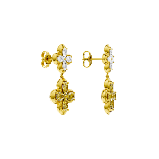 A pair of gold drop earrings from the Signature Collection, showing the white and yellow diamond flower design from a three-quarter angle.