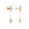 Back view of rose gold floral diamond drop earrings displaying polished gold backs, chain movement, and clean construction.
