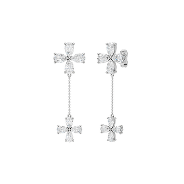 Angled view of white gold floral diamond drop earrings highlighting the dimensional flower design, articulated movement, and diamond brilliance.