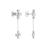 Back view of white gold floral diamond drop earrings displaying polished metal backs, chain detailing, and refined construction.