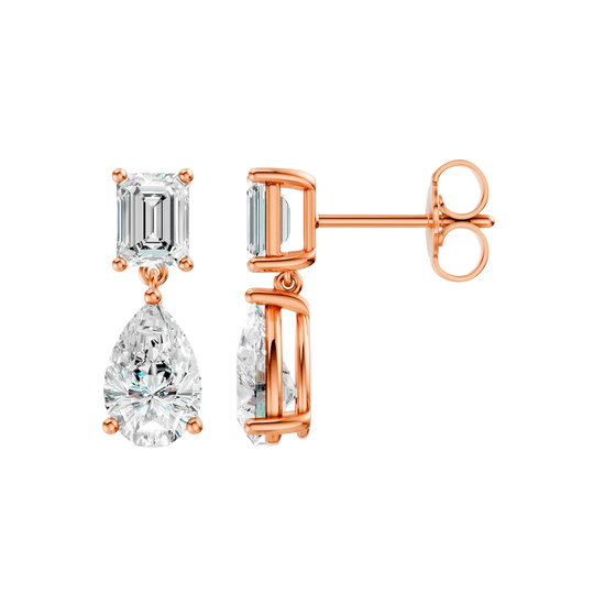 High-polish 14k rose gold drop earrings by Amorati featuring a mismatched emerald-cut and pear-cut lab-grown diamond for a modern look.