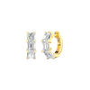 An angled view of a pair of 14K yellow gold huggie hoops, showcasing the linear design of the diamonds.