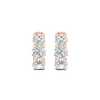 A pair of 14K rose gold huggie hoop earrings with two parallel rows of diamonds, shown from the front.