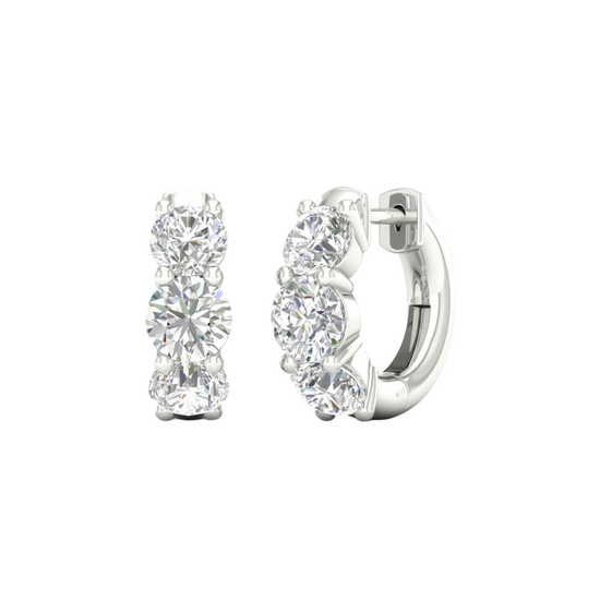 An angled view of a pair of 14K white gold huggie hoops, highlighting the wide, double-row design.