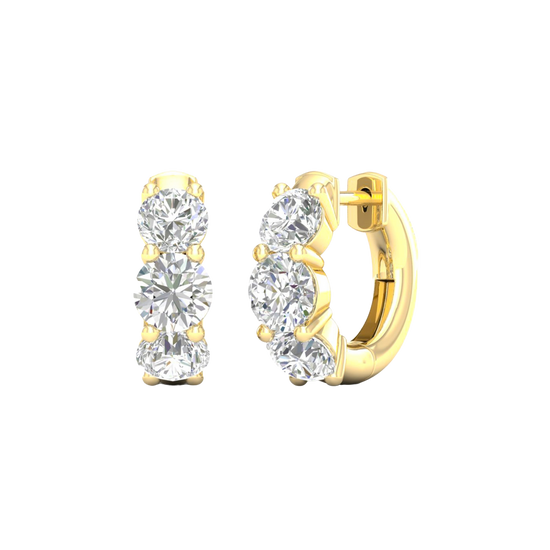 An angled view of a pair of 14K yellow gold huggie hoops, highlighting the wide, double-row design.