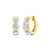 An angled view of a pair of 14K yellow gold huggie hoops, highlighting the wide, double-row design.