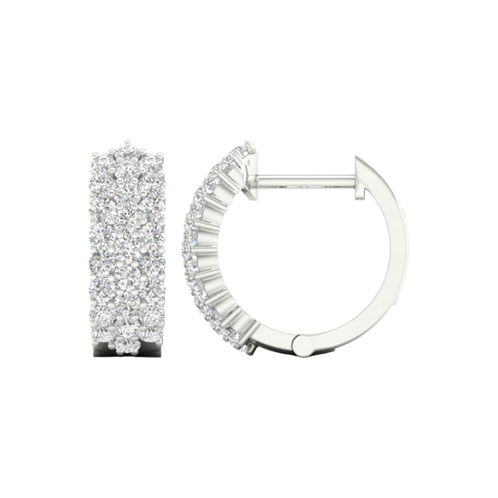 A front and side view of 14K white gold huggie hoops with triple parallel pavé diamond rows.