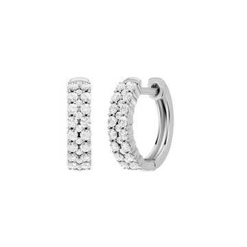 A front and side view of a 14K white gold huggie hoop highlighting its wide double-row style.