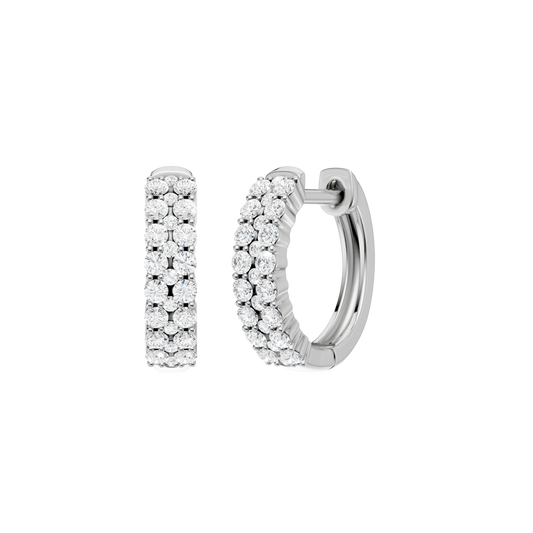 A front and side view of a 14K white gold huggie hoop highlighting its wide double-row style.