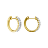 An angled view of a 14K yellow gold huggie hoop highlighting its wide double-row style.
