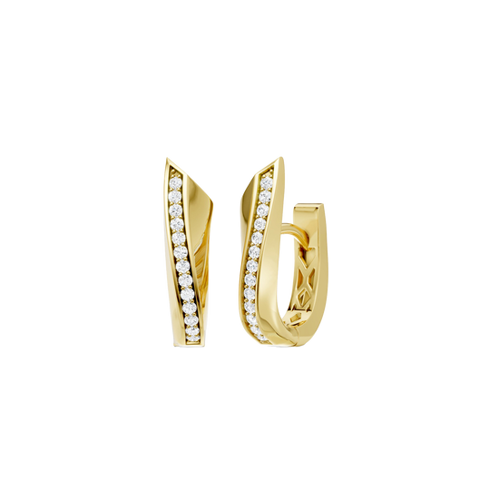 A front and angled view of a pair of 14K yellow gold huggie hoop earrings. The pavé diamonds are set in a diagonal line on the front surface, catching the light and highlighting the classic hoop shape.