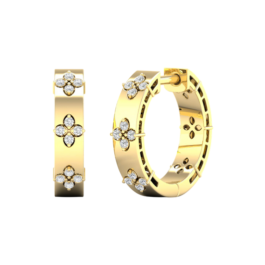 A pair of 14K yellow gold huggie hoop earrings with diamond clover accents from the Amorati Collection, displayed in both front and angled views to showcase the intricate design and thickness.