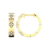 An angled view of a pair of 14K yellow gold huggie hoop earrings with a diamond floral design from the Amorati Collection. The hinge closure is visible.