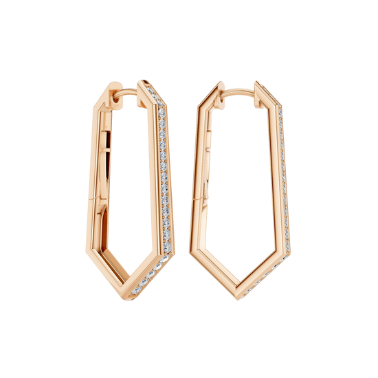 A side-angled view of a pair of 14K rose gold oval huggie hoops, showing the line of diamonds and the hinged closure.