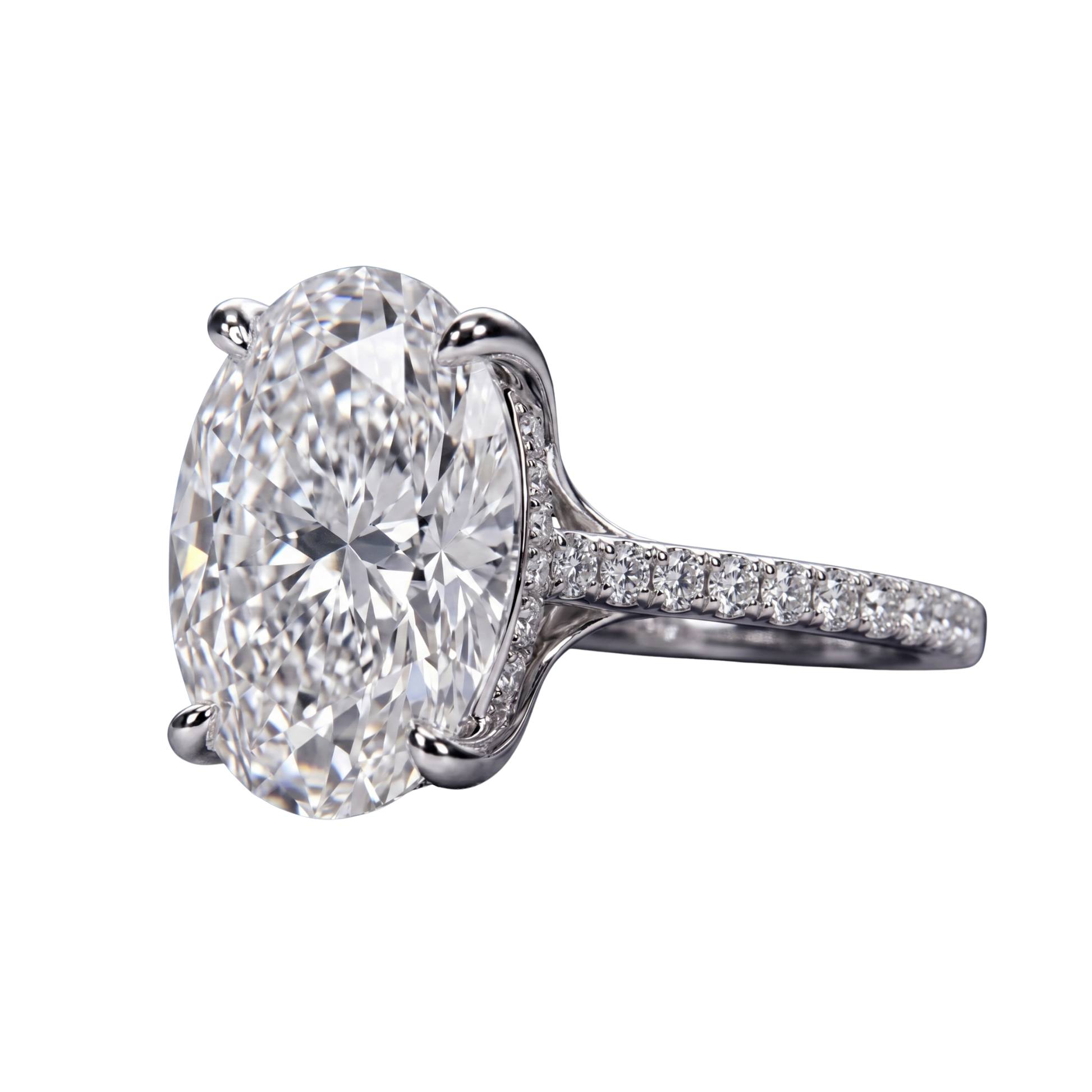 Close-up angled view of a silver-toned engagement ring featuring a large oval-cut center diamond in a four-prong setting, with a pavé diamond band, set against a transparent checkerboard background.