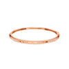 A substantial, high-polish 14k rose gold wide cuff from the Amorati Fourteen Collection, featuring scattered star and geometric insets with shimmering round lab-grown diamonds.
