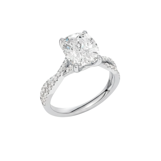 A three-quarter view of the Elongated Cushion diamond engagement ring in 14k white gold with a prong diamond band and cathedral setting