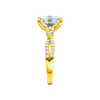 A side view of the Elongated Cushion diamond engagement ring in 14k yellow gold with a prong diamond band and cathedral setting