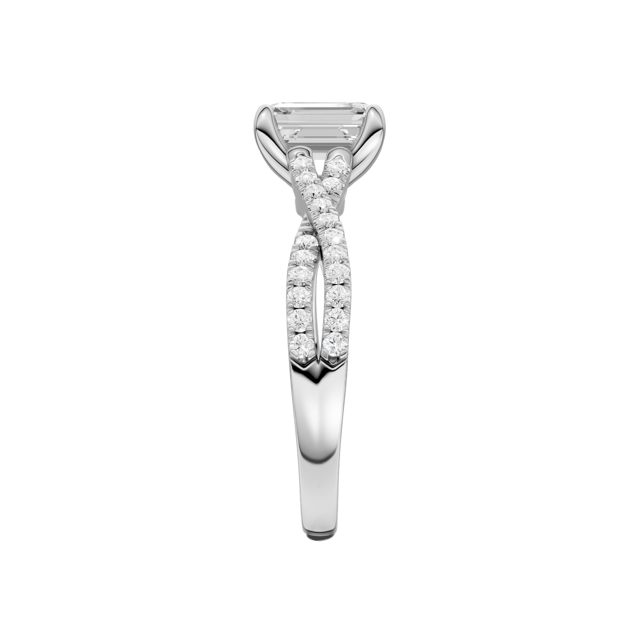 A side view of 14K white gold Amorati Vignette emerald diamond solitaire with prong setting and diamond band