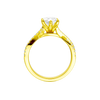 Profile view of the Marquise cut diamond engagement ring in 14k yellow gold with a prong diamond band and twist setting