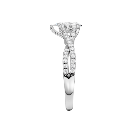 A side view of 14K white gold Amorati Vignette pear diamond solitaire with prong setting and diamond band
